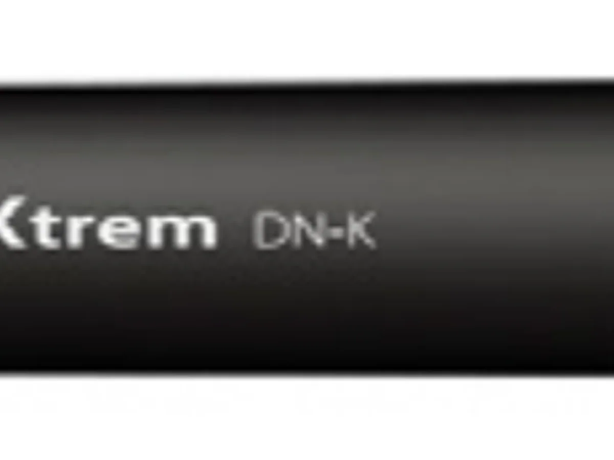 Rollo de cable Xtrem DN-K de goma negra para instalación fija en talleres industriales
